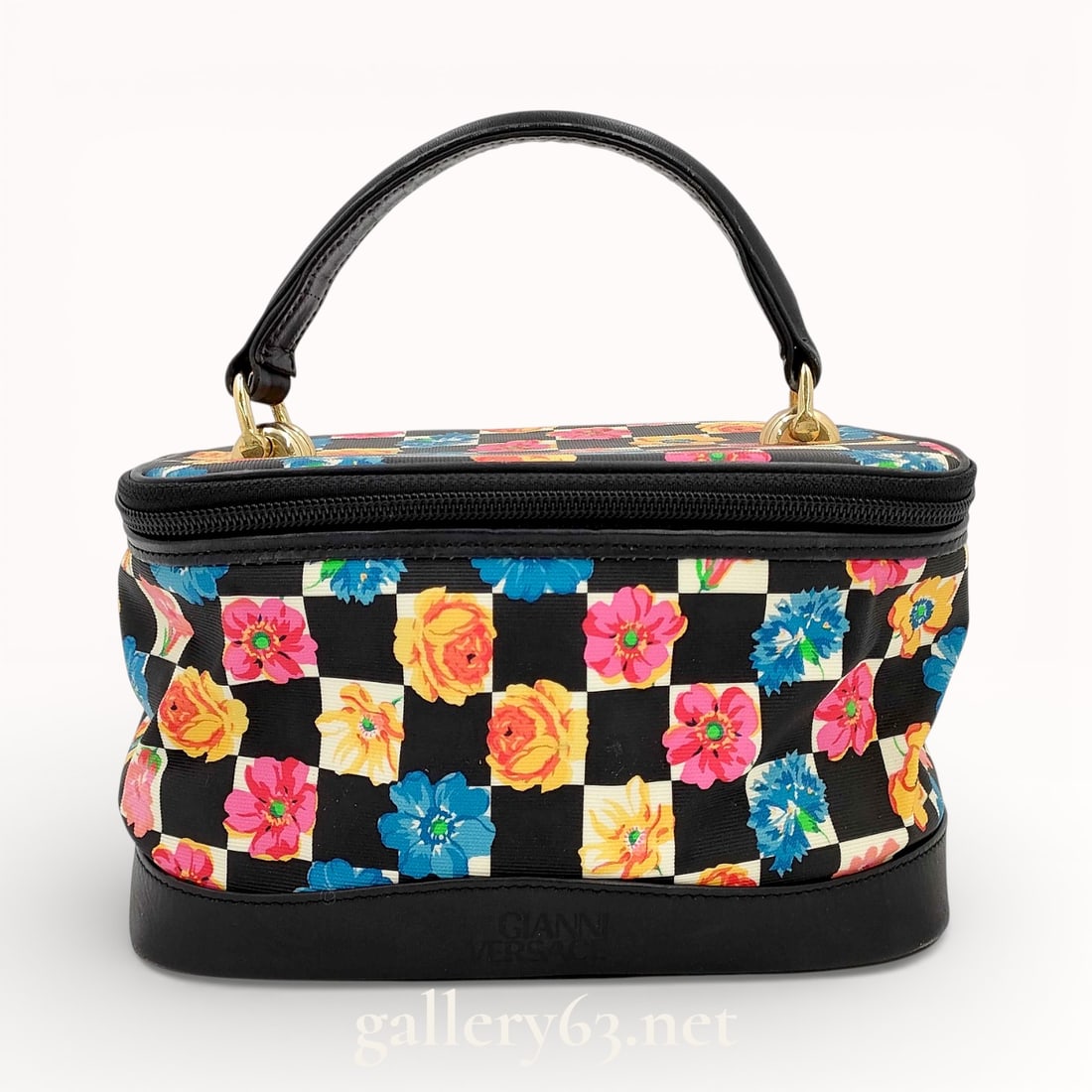 Vintage Gianni Versace Floral Cosmetic/Tote Bag: Authentic vintage Gianni Versace floral pattern total pattern vanity bag/ toiletries bag/ cosmetic bag in black nylon and leather. Checkerboard floral pattern with gold interior and gold hardware. Cla