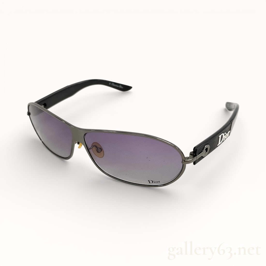 Dior Black Gradient Logo 2 Sunglasses: Christian Dior sunglasses having a metal aviator-style frame with dark tinted lenses. Temples finished in black, each side featuring applied Dior lettering. Adjustable nose pads mounted at the bridge.