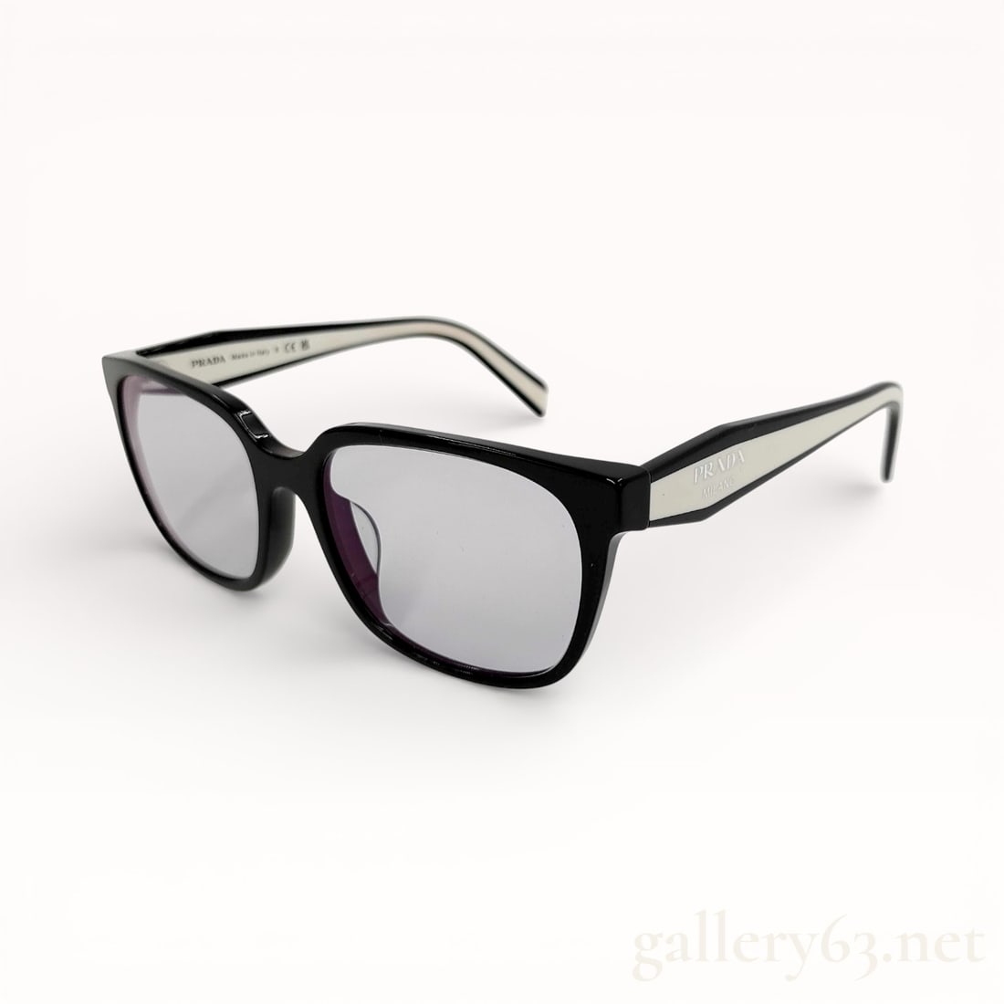 Prada 17Z-F Black Acetate Sunglasses with box: Authentic Prada Sunglasses featuring a rectangular frame crafted in glossy black acetate. Gray tinted lenses set within clean, angular rims. Slim arms extending from the frame with contrasting interio
