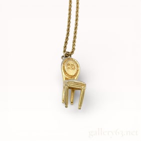Vintage Christian Dior Figural Chair Pendant on Gold-Plated Necklace