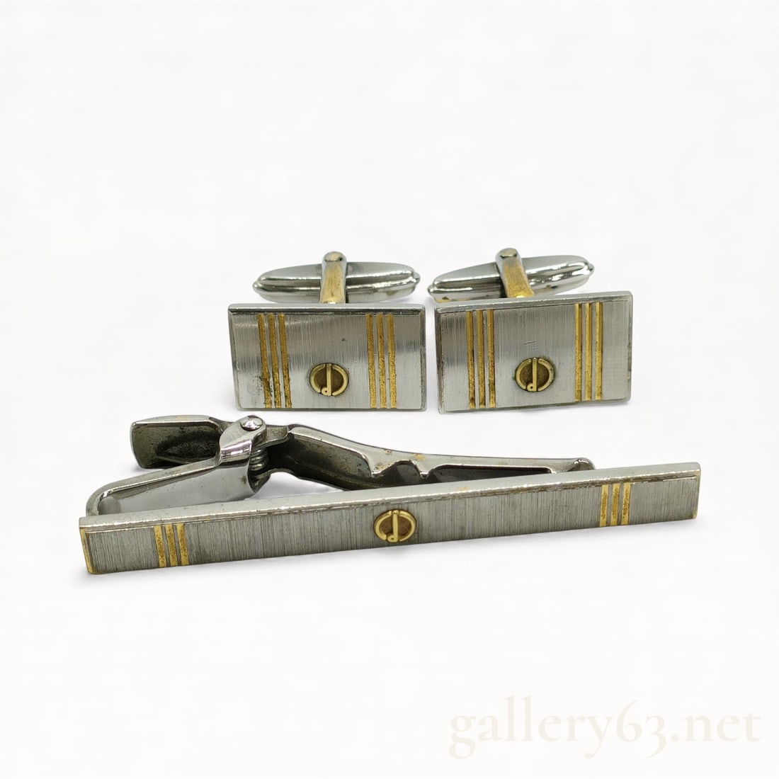 Vintage Dunhill Gold and Silver Tone Cufflinks and Tie Bar: Authentic vintage Dunhill gold and silver tone cufflinks and tie bar. Midcentury modern vintage at its very finest with these. 