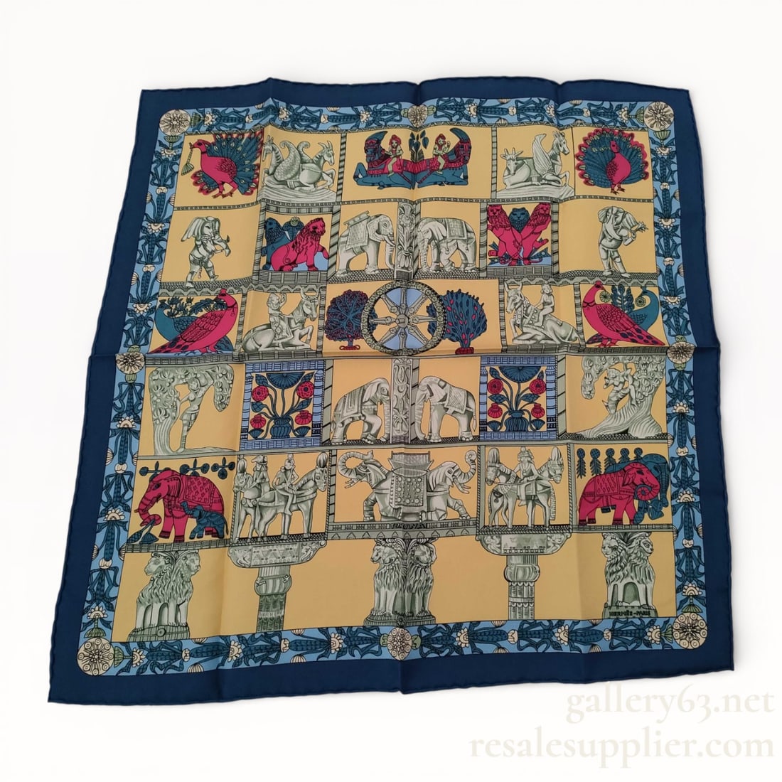 Hermès "Torana" silk scarf 45cm: Authentic Hermès "Torana" silk scarf, designed by Annie Faivre, in a blue and yellow colorway. 