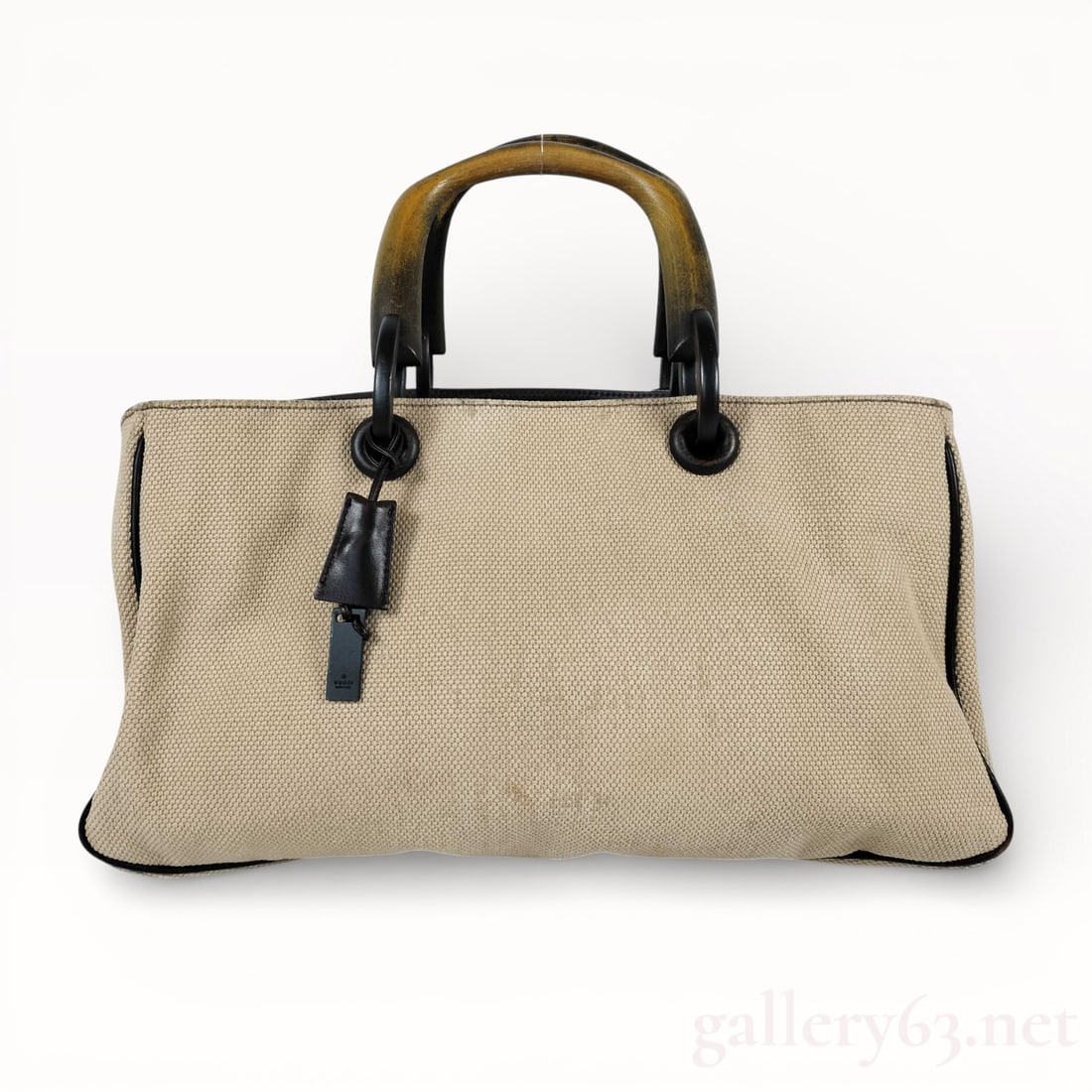 Vintage Gucci Canvas Jumbo Handbag: Authentic vintage Gucci canvas jumbo handbag with wooden handle. Incredible attention to detail. 