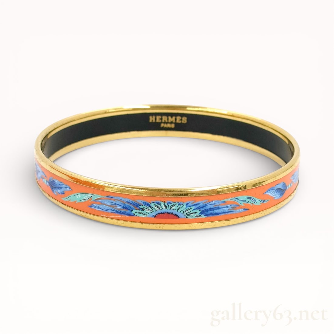 Hermes Emaille Enamel PM Cloisonne Bangle with box: Authentic Hermès wide enamel bangle bracelet with a blue, orange, and turquoise feather "Brazil" print design and yellow gold-plated hardwar