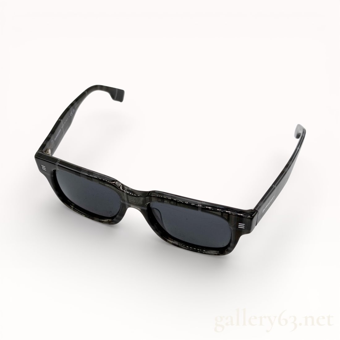 Burberry B4394 Check-Detail Sunglasses: Authentic Sunglasses featuring a rectangular black acetate frame with gray tinted lenses. Slim profile with straight-lined rims creating a structured silhouette. Interior temples accented with Burberr
