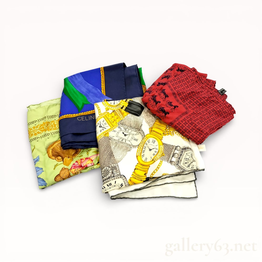 Designer Silk Scarf Group Including Céline, Gucci, and Others: Group of designer silk scarves comprising examples by Céline, Gucci, and additional makers. Assortment featuring varied color palettes and designs including graphic borders, equestrian and deco