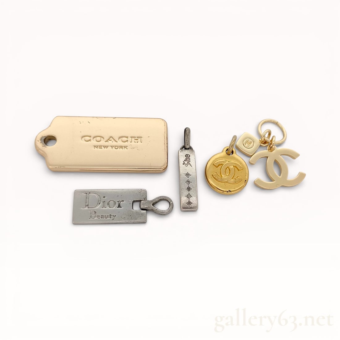 Collection of Pendants from Chanel, Dior and Coach (1 of 7)