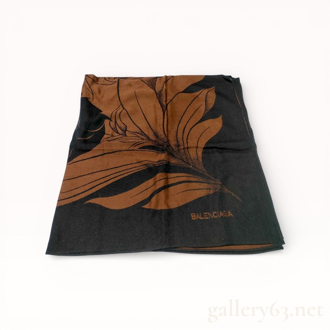 Balenciaga Printed Shawl 140cm: Balenciaga stole featuring an abstract floral motif in brown and black tones. Lightweight textile construction with a soft hand. Rectangular format suitable for draping or wrapping. Balenciaga name
