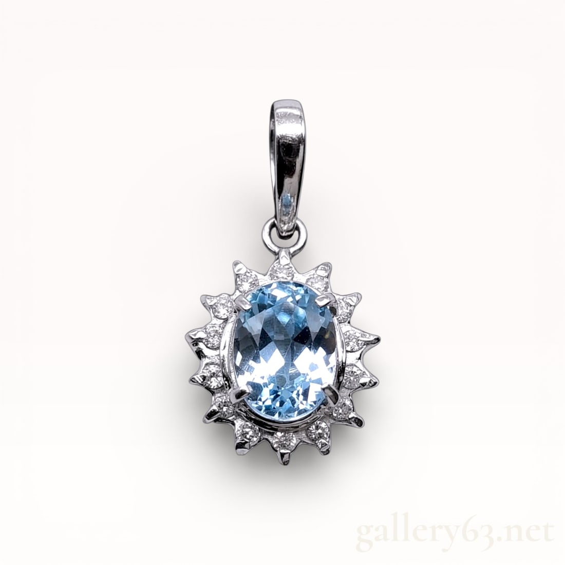 Platinum Oval-Cut Aquamarine and Diamond Pendant: Platinum pendant top set with an oval-cut aquamarine weighing approximately 0.98 carat, surrounded by round-cut diamond accents totaling approximately 0.10 carat. Pendant featuring a scalloped