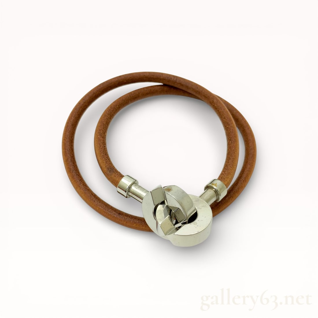 Hermès Lancelot Double-Wrap Leather Bracelet: Authentic Hermes double-wrap bracelet featuring brown leather cords with a smooth, rounded profile. Silver-tone metal clasp forming the Lancelot motif, composed of a circular ring with a pivoting bar