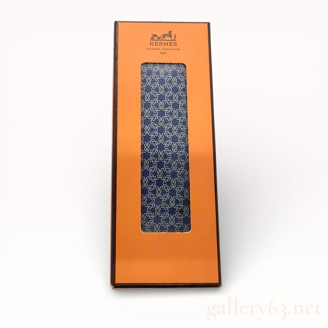 Hermès Blue All-Over Pattern Silk Tie, Unopened, with Box: Hermès silk necktie featuring an allover repeating pattern rendered in shades of blue. Woven silk fabric having a smooth finish and classic pointed blade ends. Presented in the original Hermès prese