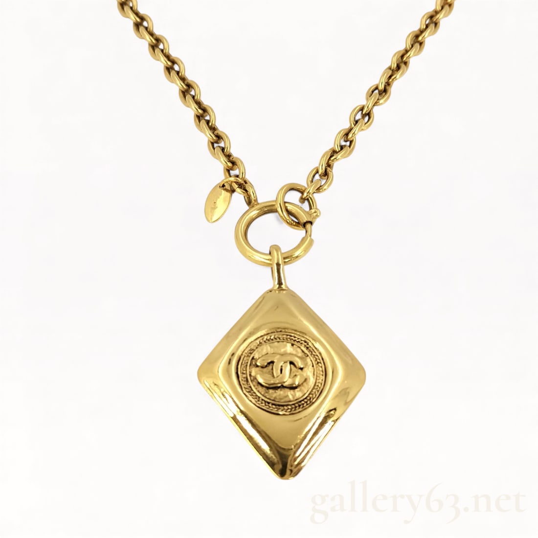 Vintage & Massive Chanel Necklace Gold Chain & Lozenge Pendant 1980s Huge Chunky Chain & Necklace: Vintage Chanel Necklace Gold Lozenge 1980s. Featuring a chunky chain with the trademark Chanel oversize bolt ring. The iconic Chanel Lozenge Logo Pendant with the unmistakable interlocking double Cs a