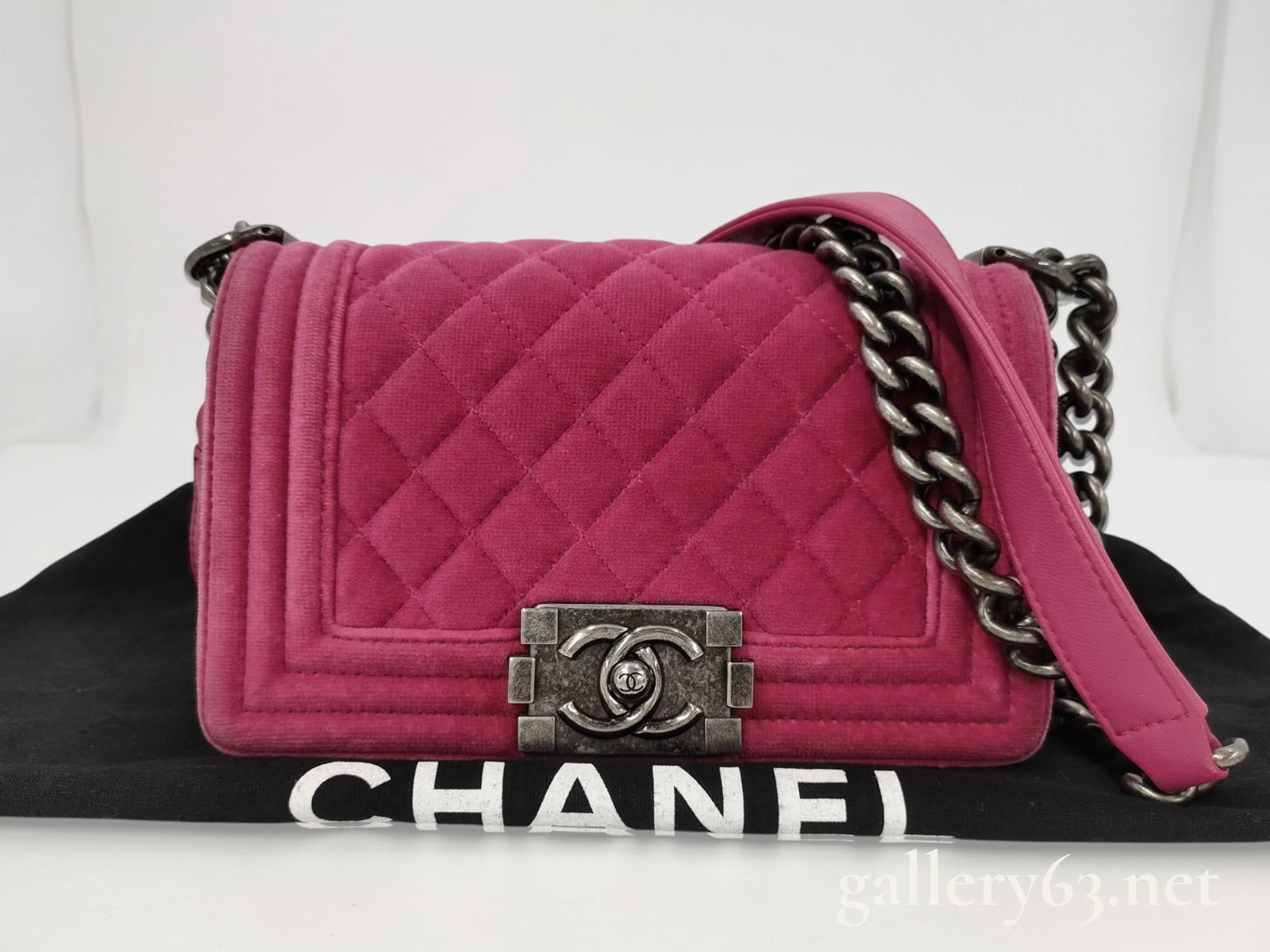 Chanel Boy Chanel Quilted Velvet Pink Shoulder Bag: Authentic Chanel Boy small quilted velvet shoulder bag in a pink fuchsia color with ruthenium hardware. Comes with a dust jacket and sticker still attached to the inside. No card included. Great condi