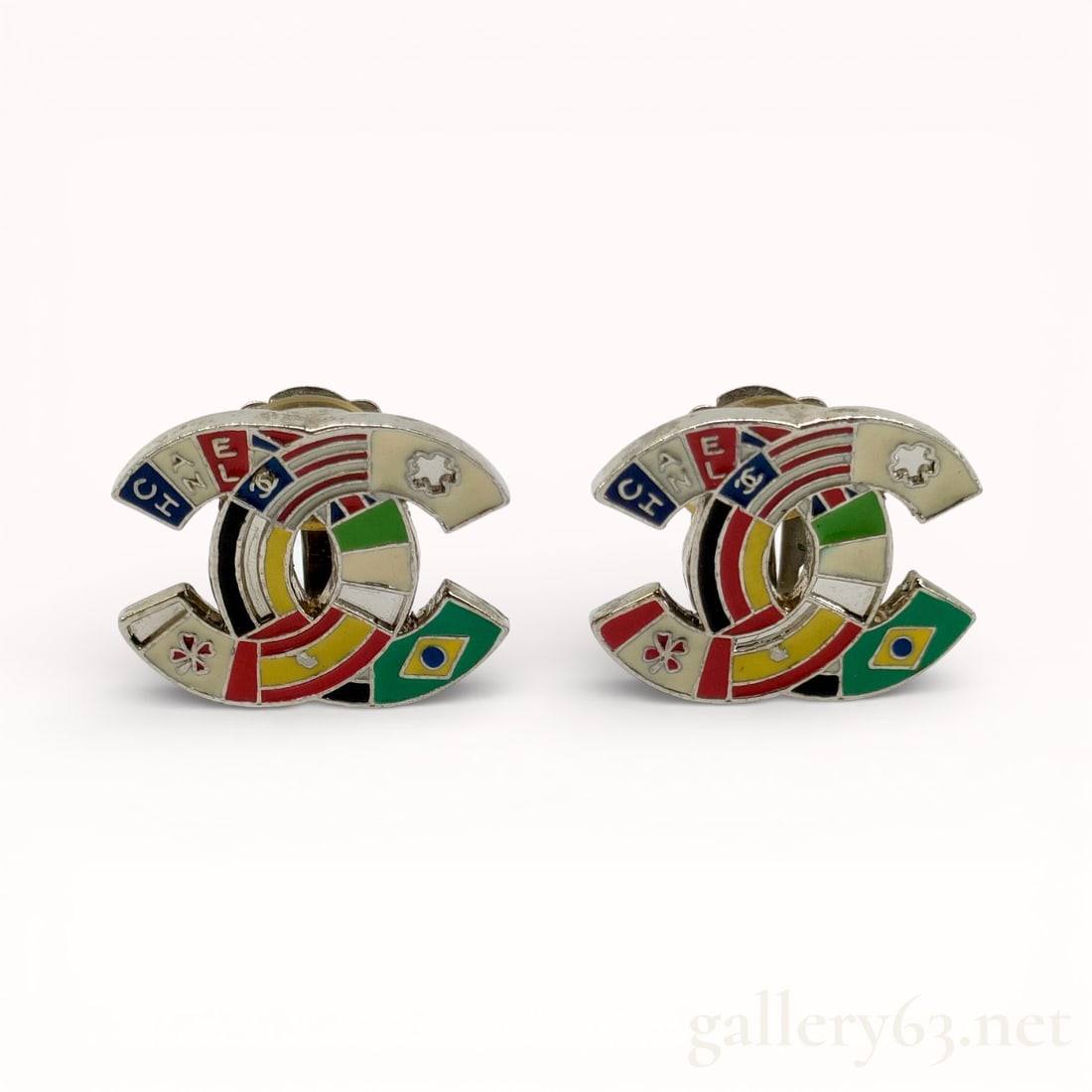 Rare Archive Chanel 03A Enamel CC Earrings: Authentic Chanel 2003 Flag Enamel CC Earrings. We have the matching necklace. Pair of silver-tone clip earrings having interlocking CC forms. Surfaces set with multicolor enamel panels featuring