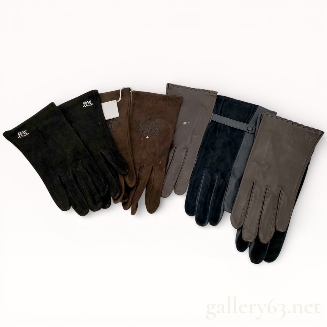 Group of 4 Leather and Suede Dior Gloves: Authentic Group of 4 Leather and Suede Dior Gloves. These are being sold as a group because they are not in perfect condition. Please review the photos and bid accordingly.