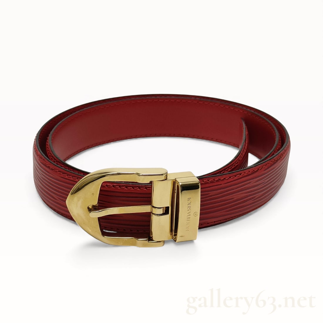 Louis Vuitton Epi Saint-Ture Classic Red Leather Belt w/ gold Hardware: Authentic Louis Vuitton Epi Saint-Ture Classic Red Leather Belt w/ gold Hardware. This striking red and gold contrasted belt is presented in excellent condition with original box. 