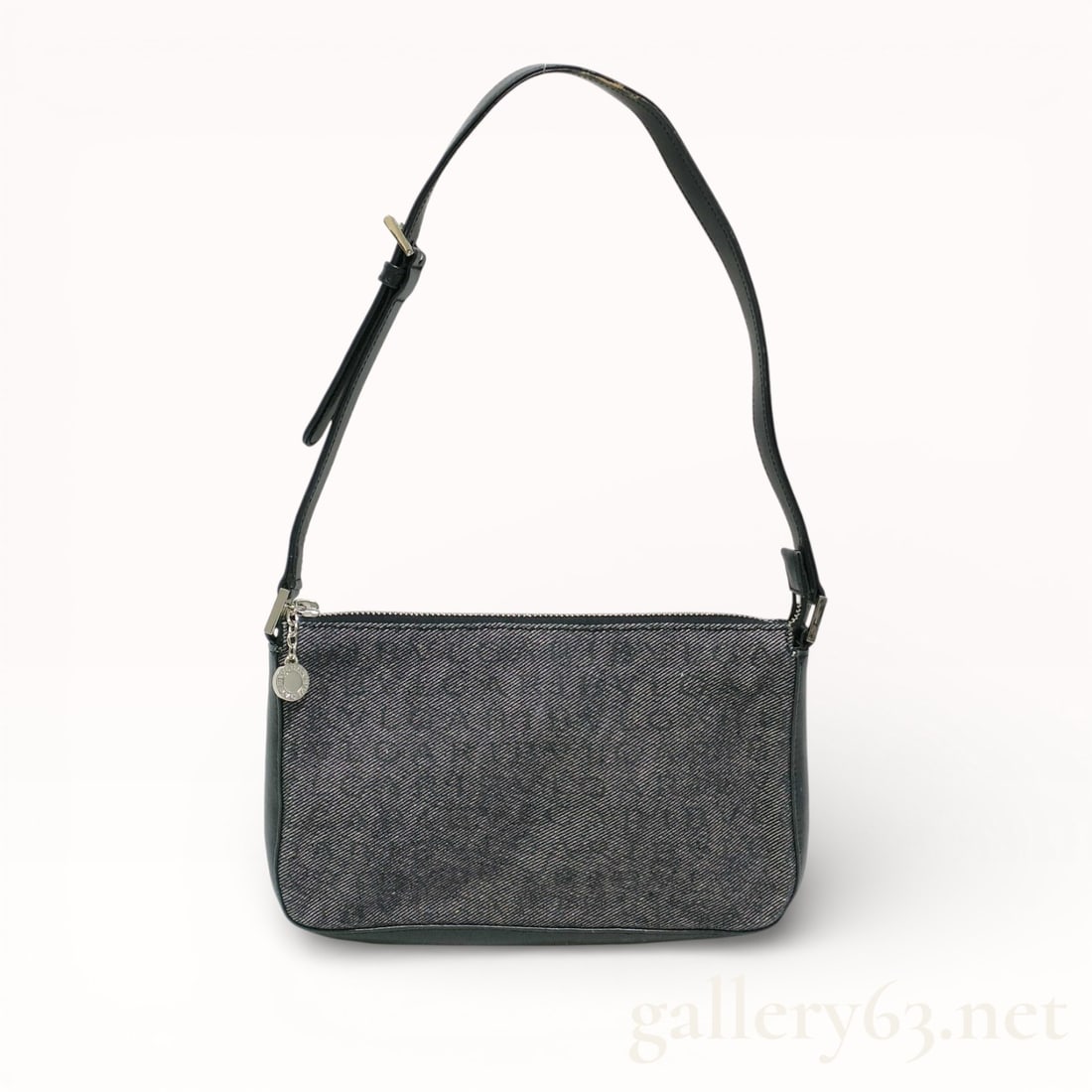 Bulgari Black Logomania Shoulder Bag Leather and Canvas: Authentic Bulgari Logomania black canvas and leather shoulder bag with nickel hardware. Some signs of use as photographed.