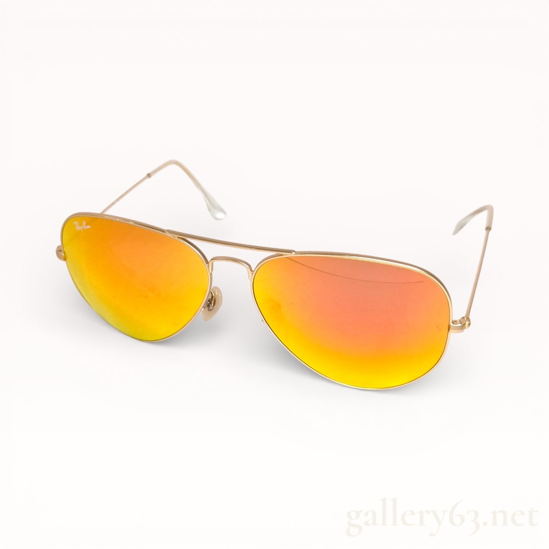 Ray-Ban Aviator Teardrop Sunglasses: Authentic Ray-Ban Aviator-style sunglasses featuring teardrop-shaped lenses with mirrored orange gradient tint. Thin gold-tone metal frame with double bridge construction. Adjustable nose pads