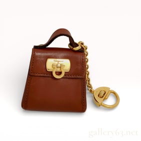 Salvatore Ferragamo Gancini keychain with Gold tone Hardware