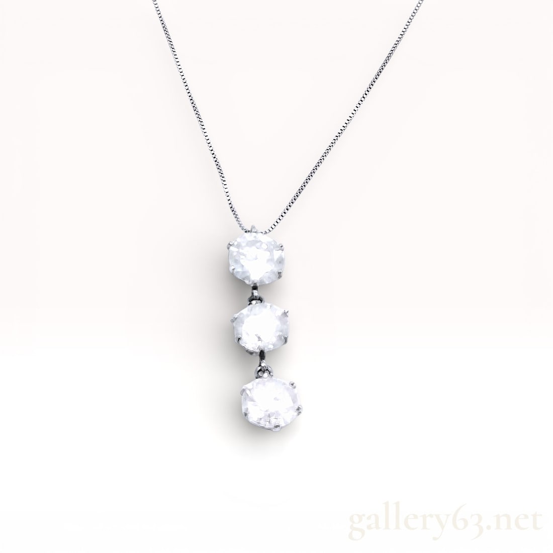 1.60ctw Natural Diamond Platinum Drop Pendant Necklace 16": Platinum necklace featuring three round brilliant-cut diamond stations arranged in a vertical drop formation. Diamonds set individually in open-backed platinum mounts, connected with articulated links