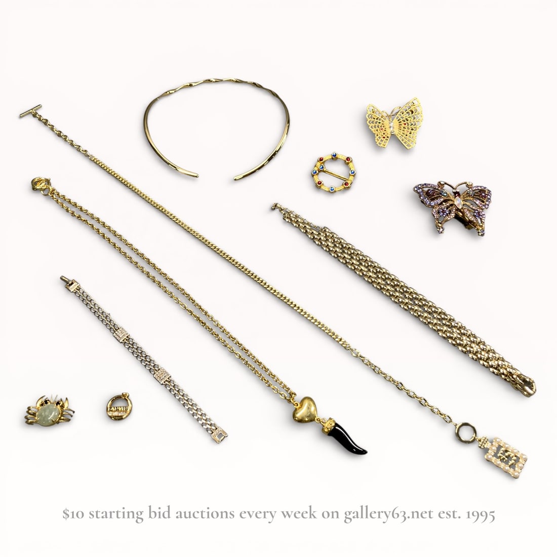 Nina Ricci , Lanvin, Crab, Jewelry Assortment, Medieval Lover's 13th. C. Museum Brooch: Nina Ricci jewelry assortment including mixed gold-tone necklaces, bracelets, and decorative pieces. Group featuring chain-link necklaces, charm-style pendants, and articulated bracelet forms. Selecti