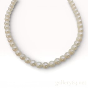 Opera-Length Strand of Cultured Pearls 6.0mm-6.1mm with Silver Clasp