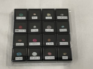 Sixteen Faceted & Cabochon Gemstones - Opal, Topaz, Chalcedony etc.