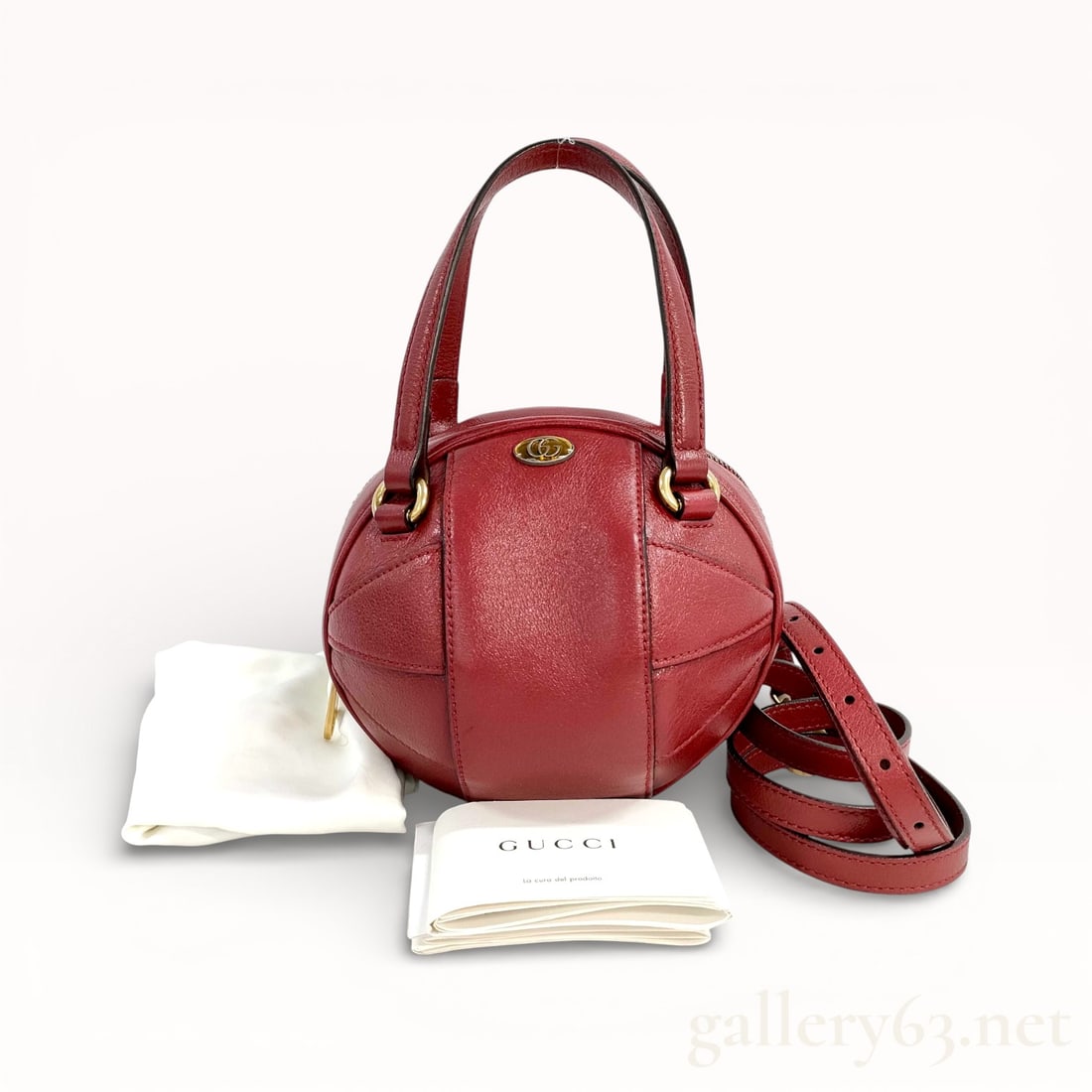 Gucci Tifosa Mini Basketball Leather 2WAY Handbag with Dust Bag and Booklet: Gucci Tifosa mini basketball handbag having a spherical silhouette crafted in red calfskin leather. Design referencing a basketball form, featuring curved panel construction and contrasting seam detai