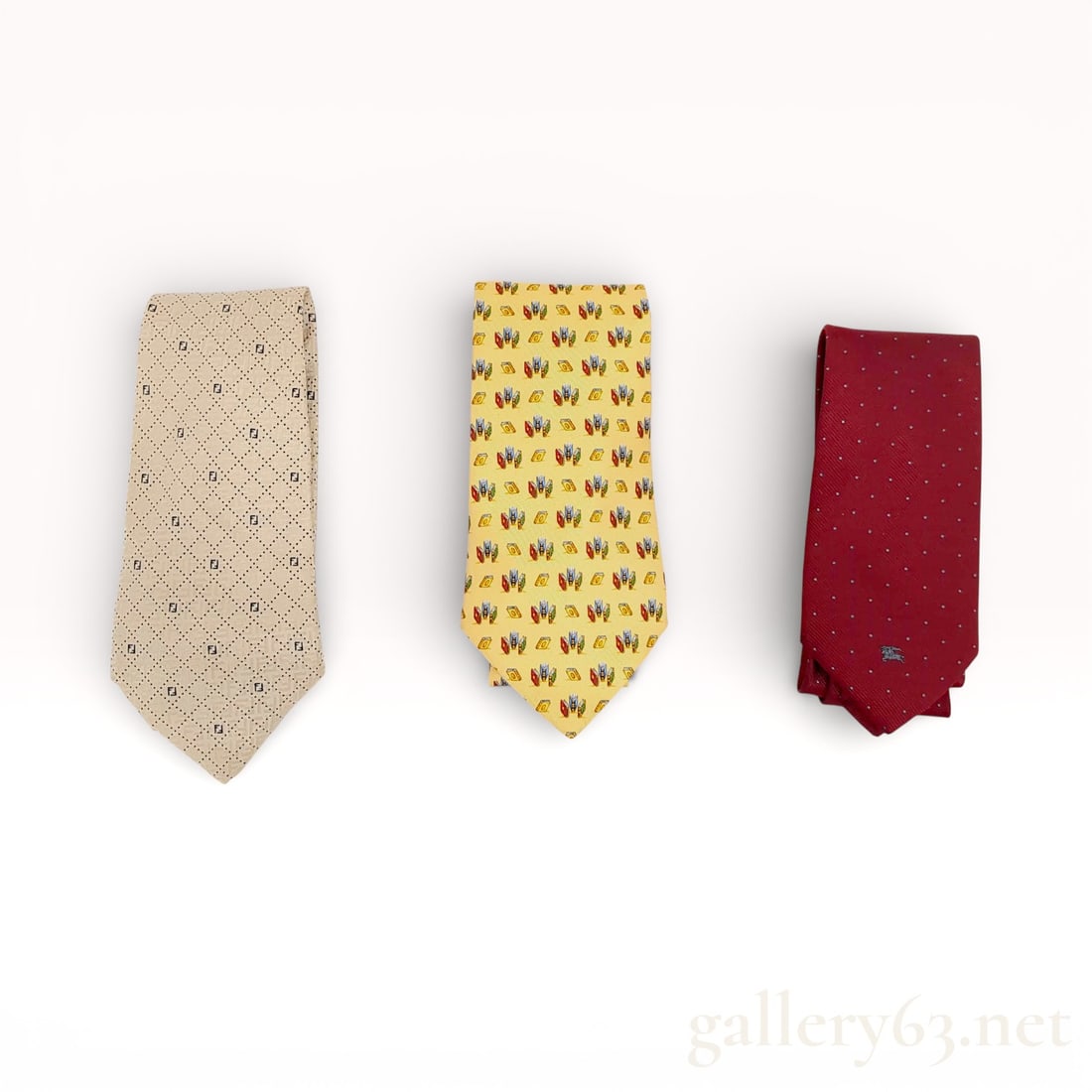 Group of 3 Designer Silk Ties: Salvatore Ferragamo, Fendi, and Burberrys.. Ferragamo Book Print: Authentic Group of 3 Designer Ties: Salvatore Ferragamo, Fendi, and Burberrys. These are all so cool. And the Ferragamo Book print tie is incredible. It would be a great gift for your child's english