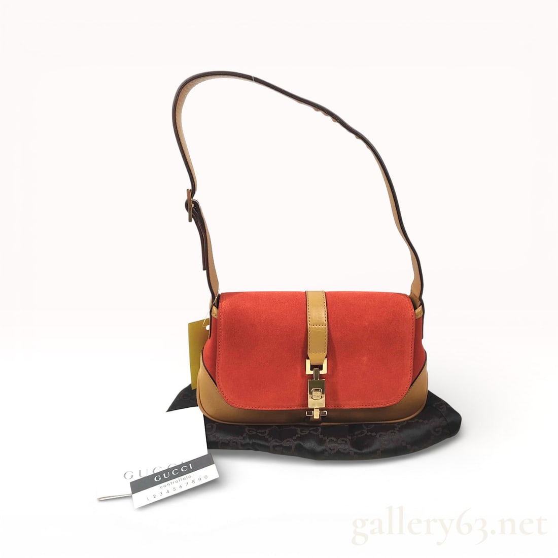 Gucci Piston-Lock Jackie Small 007 2038 Shoulder Bag: Authentic Gucci Jackie shoulder bag featuring a blood-orange suede body with tan leather trim. Flap front secured by a gold-tone piston-style Jackie clasp centered by a vertical leather strap. Adjusta