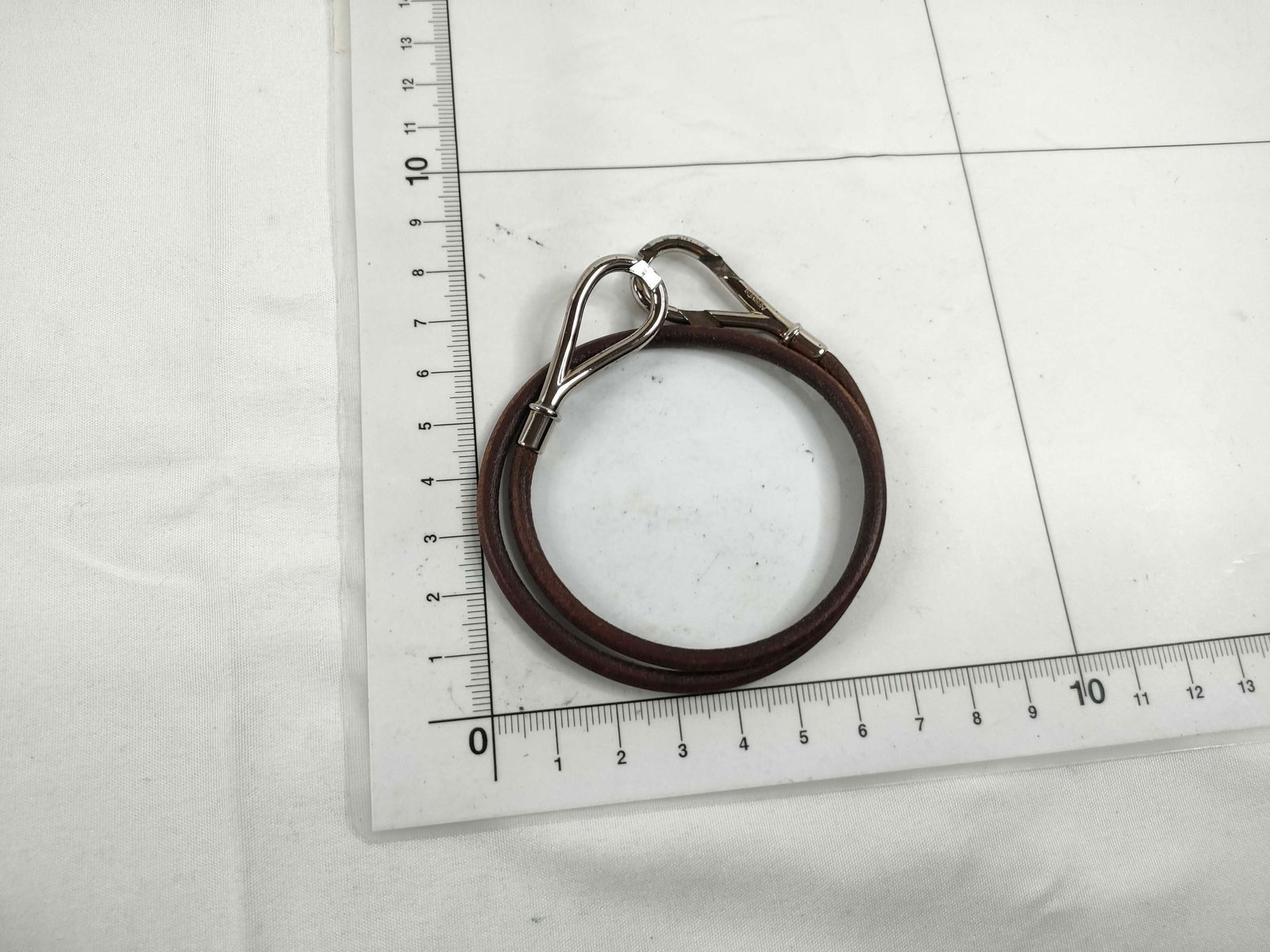 Hermès Jumbo Hook bracelet in brown leather with Palladium Plated Hardware: authentic Hermès Jumbo Hook bracelet in brown leather with palladium-plated metal hardware