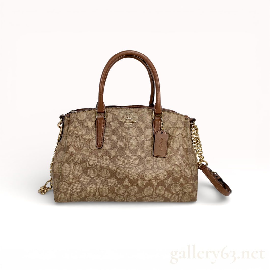 Coach Signature F29683 Two-Way Satchel Bag: Coach signature canvas satchel having an allover tonal “C” monogram pattern. Structured dome-shaped silhouette trimmed with brown leather. Dual rolled leather top handles attached at the upper