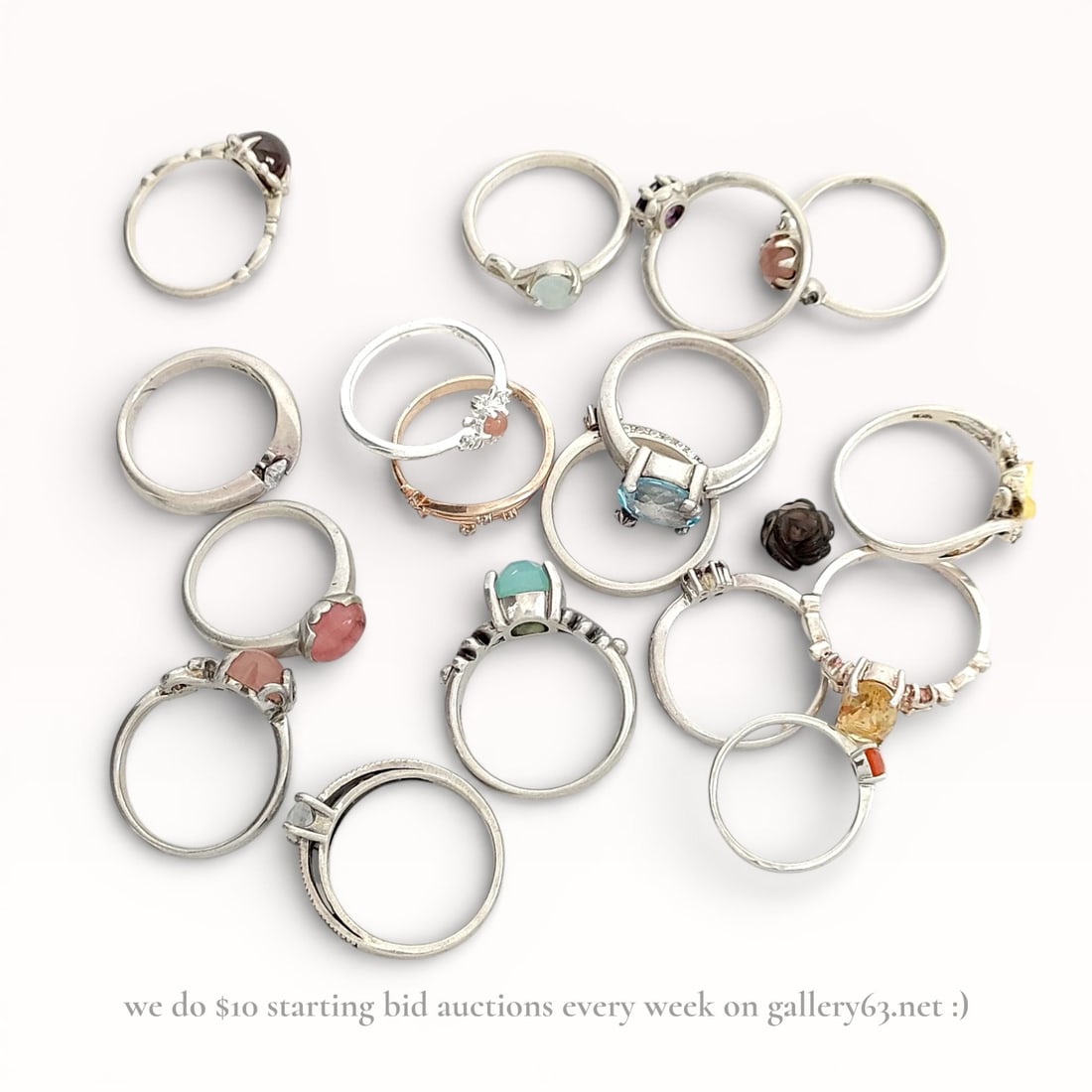 Sterling Silver Ring Assortment with Stones: Ring assortment comprising multiple sterling silver rings set with assorted stones. Designs including cabochon and faceted settings in varied colors and forms, with bezels, prongs, and decorative