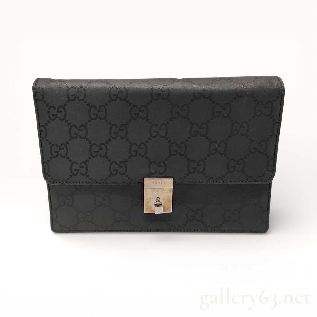 Gucci GG Imprime Leather Flap Bag: Authentic Gucci leather bag featuring an allover GG Imprime pattern in black. Design having a structured rectangular silhouette with a fold-over flap and a polished metal push-lock closure at the fron