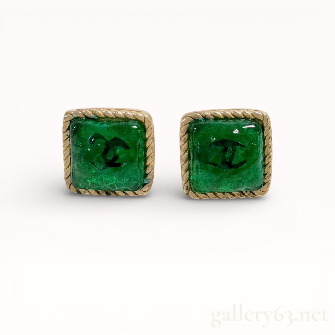 Chanel Green and Gold Fall 1993 collection Earrings: Authentic Chanel earrings, square gold-tone mounts, each featuring a translucent green panel set flush within a raised rope-patterned border. Design including a centrally placed interlocking double-C