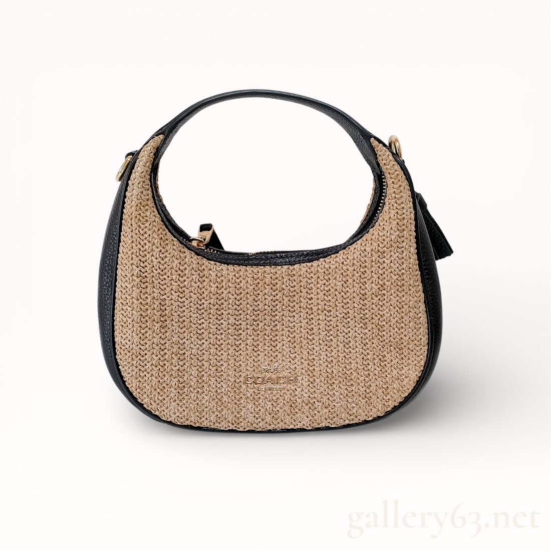 Coach Carmen Crossbody Handbag: Authentic crossbody handbag by Coach, having a structured body. Exterior featuring a woven knit textured surface and understated branding. Interior comprising a single main compartment with additional