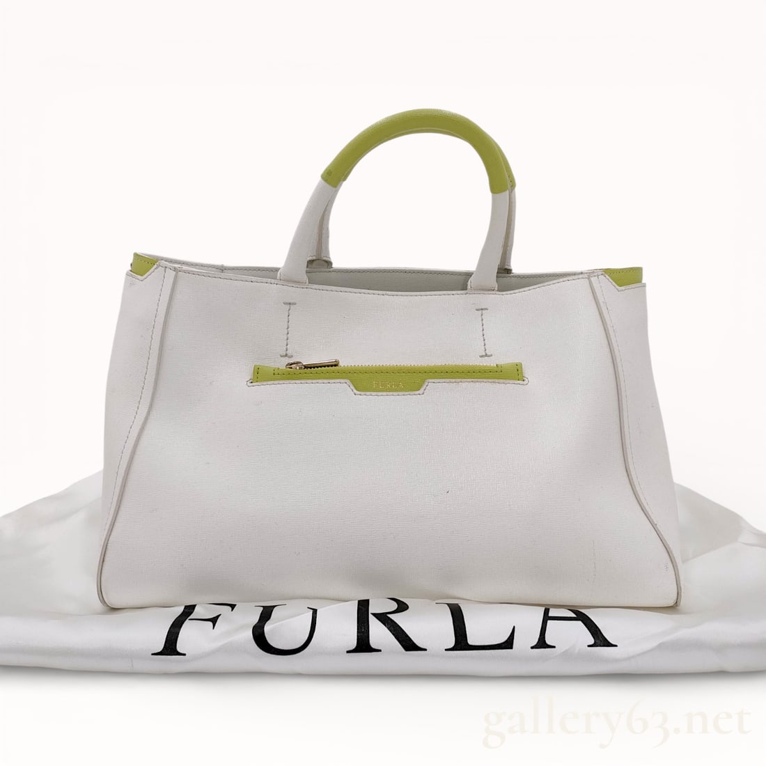 Furla White and Light Green Leather Tote Bag: Authentic Furla white and light green leather tote bag having dual top handles and an open top. Featuring a rectangular body with stitched panels and a smooth leather finish. Interior comprising a sin