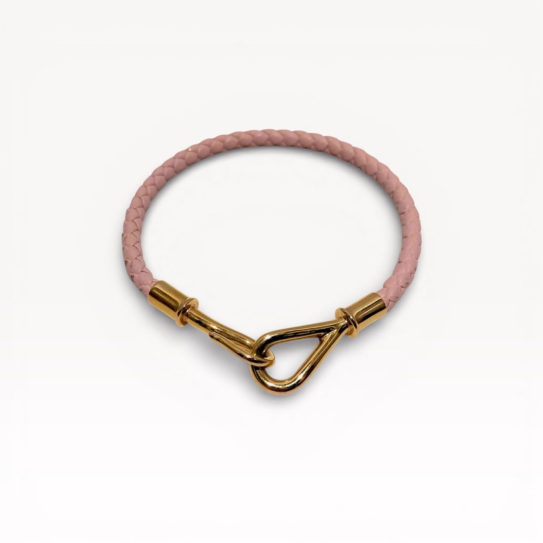 Hermès Jumbo Hook bracelet in braided pink Swift calfskin leather with gold-plated hardware: Authentic Hermès Jumbo Hook bracelet in braided pink Swift calfskin leather with gold-plated hardware. 15/16cm, for a slightly below average sized wrist. Gorgeous design.