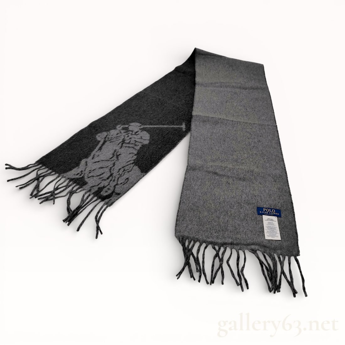 Polo Ralph Lauren Grey Wool Scarf: Authentic Polo Ralph Lauren long rectangular wool scarf in shades of gray, featuring a two-tone design with a darker panel displaying a large woven equestrian figure (Polo Logo) and lighter contrastin