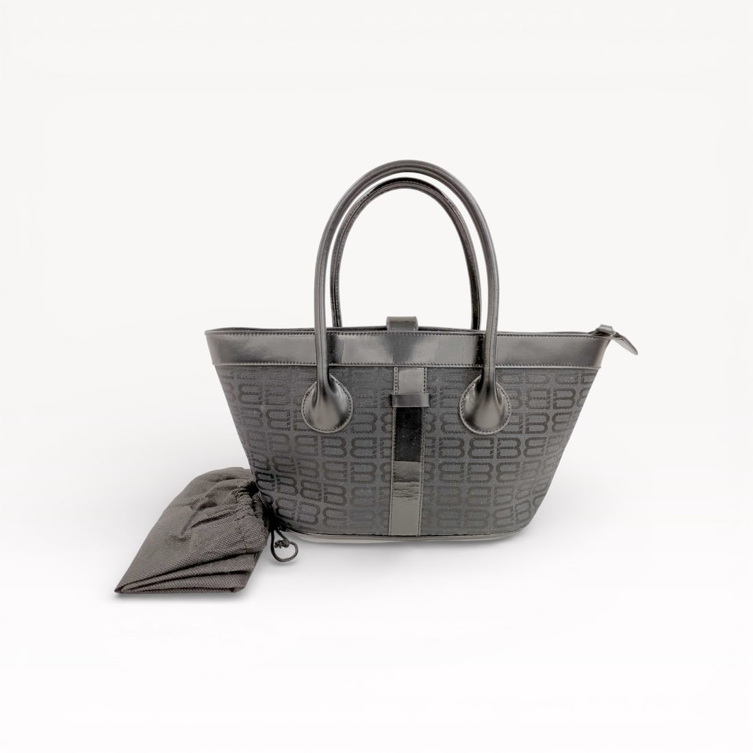 Balenciaga BB Logo Tote Bag in Grey with Leather Handles: Authentic Balenciaga BB tote bag featuring a grey jacquard fabric with repeating BB logo pattern. The structured silhouette is accented with smooth leather trim, dual rolled leather top handles, and a