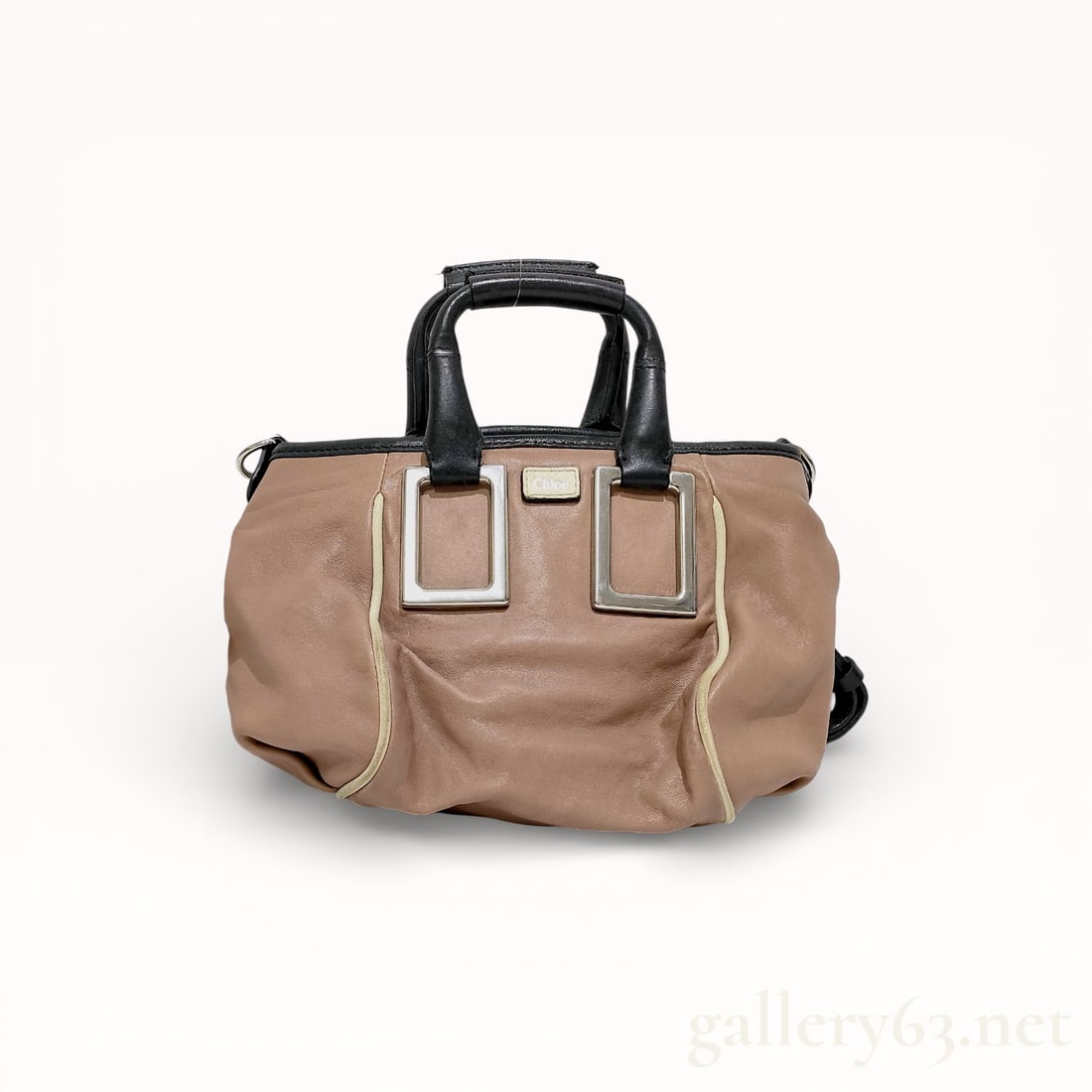 Chloe Storage Shoulder Bag: Authentic Shoulder bag by Chloé, a structured storage-style form. Exterior featuring smooth surfaces with visible seams and reinforced edges. Interior having a main compartment with additional pocket