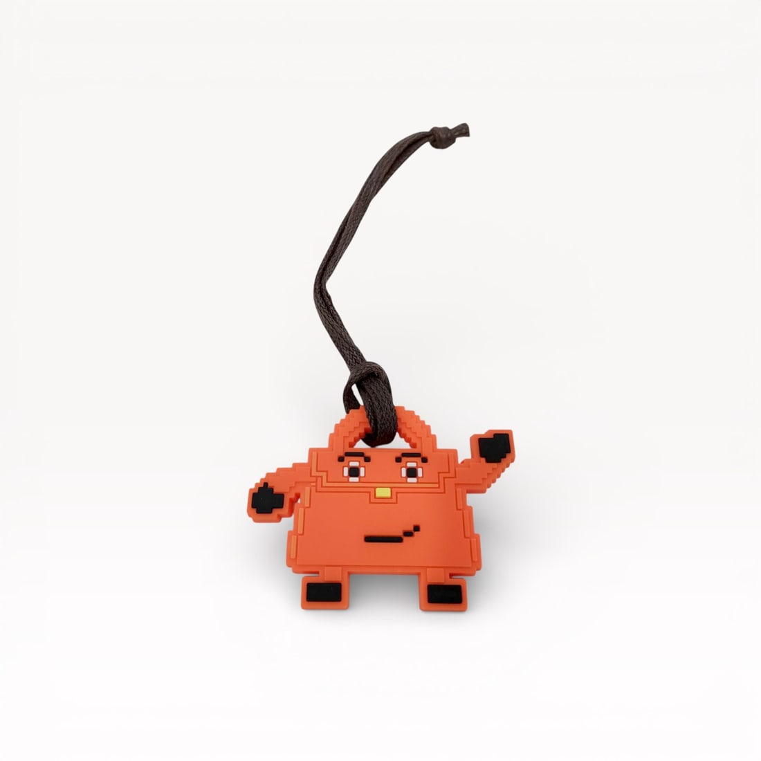 Hermès Kelly Doll Bag Charm in Orange Rubber with Leather Cord (1 of 6)