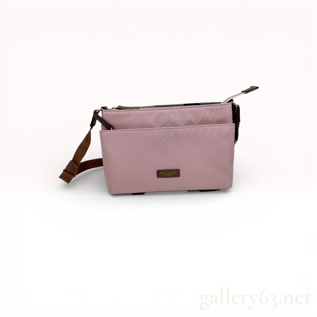 Blue Label Pink & Brown Tartan Shoulder Bag: We thought this was a Burberry bag but it's just a bag by a brand called Blue Label that looks mysteriously similar to a Burberry bag. 