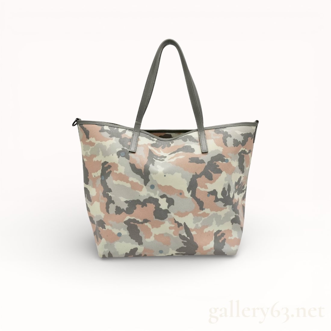 Gentil Bandit Camoflauge Tote Handcrafted in Nylon & Leather: Authentic Gentil Bandit Camoflauge Tote artfully hand-crafted in Japan. F featuring the brand’s signature modern camo print and clean, structured silhouette. Lightweight with dual shoulder straps an