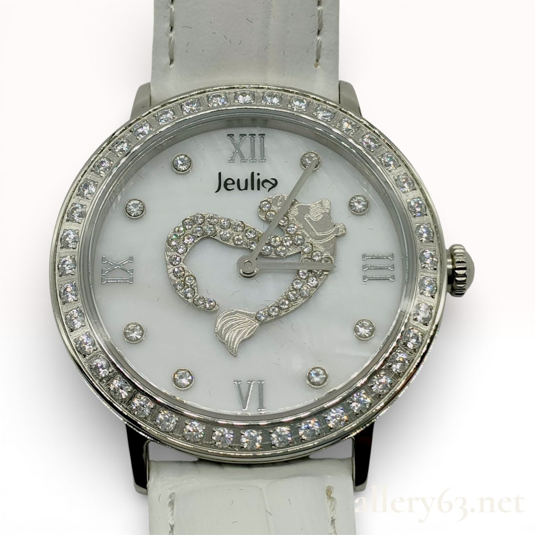 Jeulia "Dancing by the Moonlight" Fashion Mermaid Women's watch with box 36mm: Authentic Jeulia "Dancing by the Moonlight" fashion mermaid women's watch with a white strap and crystal embellishments. 