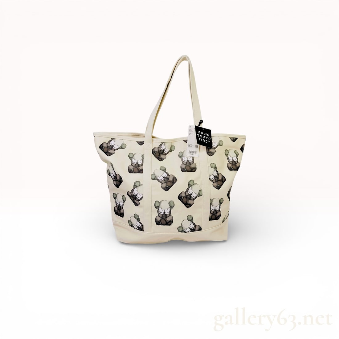 Uniqlo x KAWS Tokyo First Canvas Tote Bag Featuring Allover Companion Print with Tags: this one is fun and very collectible in the KAWS world, especially with the Tokyo First tie-in and tags attached. Uniqlo x KAWS Tokyo First canvas tote bag featuring an allover Companion figure print
