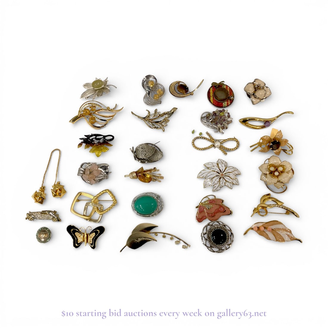 Group of 28 Gold-Tone and Silver Brooch Set: Brooch grouping with multiple individual brooches presented together. Assortment featuring gold and silver finishes, with mixed metal appearances throughout. Designs including floral forms, leaves, in