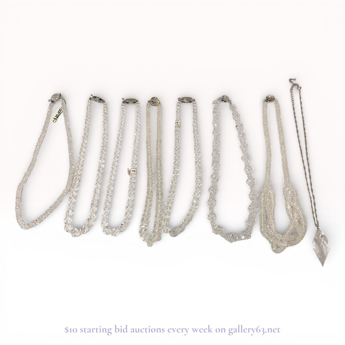 Crystal Necklaces with .925 Silver Fittings - Lot of 8, Jewelry Collection: Authentic crystal jewelry grouping of eight necklaces. Assortment featuring clear crystal beads in faceted and smooth forms, arranged in single-strand constructions. Necklaces showing graduated and un