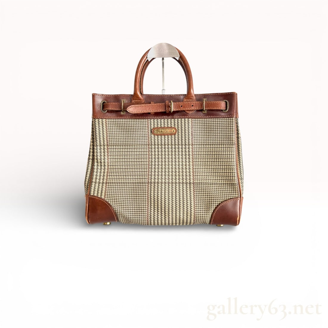 Polo Ralph Lauren Houndstooth Jacquard Canvas & Leather Equestrian Tote Bag: Authentic Polo Ralph Lauren houndstooth canvas tote bag featuring a structured rectangular silhouette in brown and cream patterned textile. Smooth leather trim accents along the top edge, corners, and