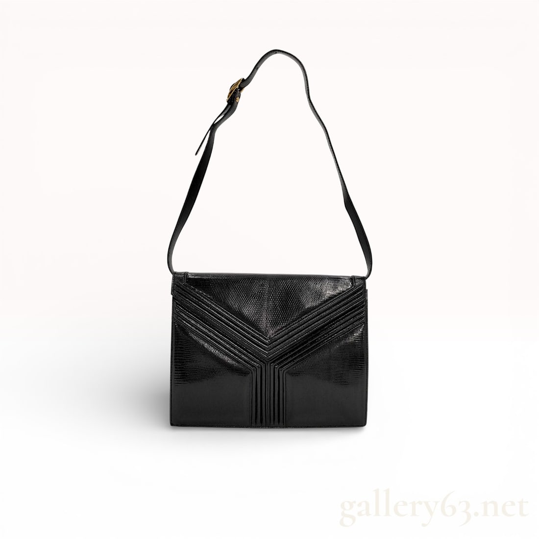 Yves Saint Laurent Vintage Black Leather Envelope Shoulder Bag: Authentic Yves Saint Laurent black leather shoulder bag featuring a structured rectangular silhouette. Front exterior featuring a geometric Y-stitch panel design with layered leather detailing. Flap c
